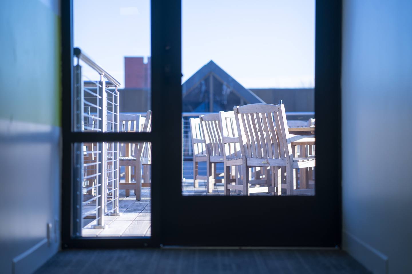 Outdoor porch with tables and chairs